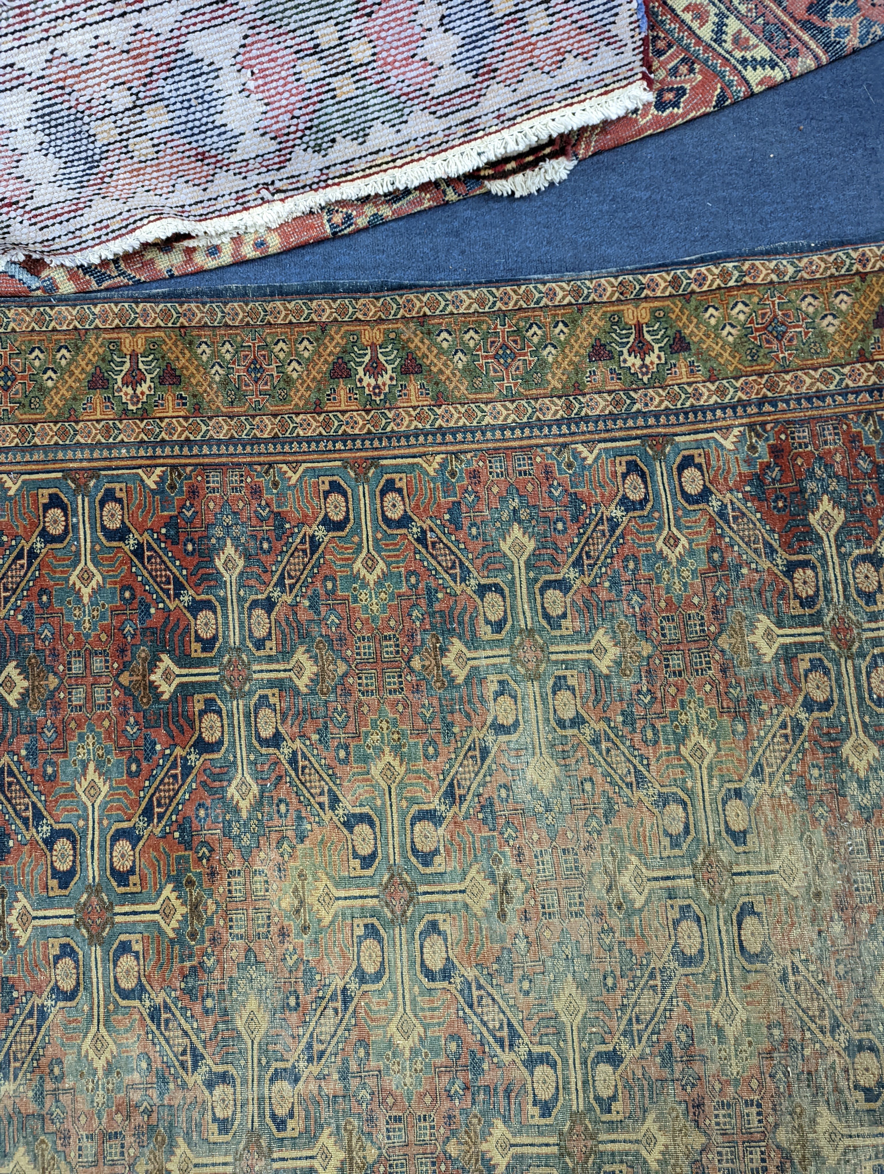 Three antique rugs, Caucasian and North West Persian, largest 230 x 154cm